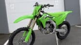 Kawasaki KX250X dirt bike for off-road adventures, displayed outside Squamish Motorsports Marine & R.