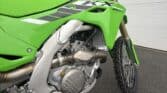 KX250X Kawasaki dirt bike with high-performance engine and rugged tires. Perfect for motocross and t.